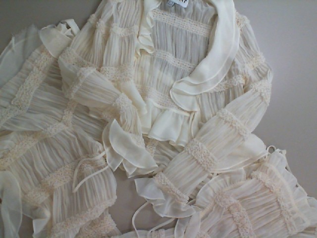 Set of trousers and blouse, white Set of trousers and blouse, white