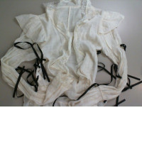 white blouse with black laces white blouse with black laces