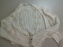 Beige knitted sweater Beige knitted sweater