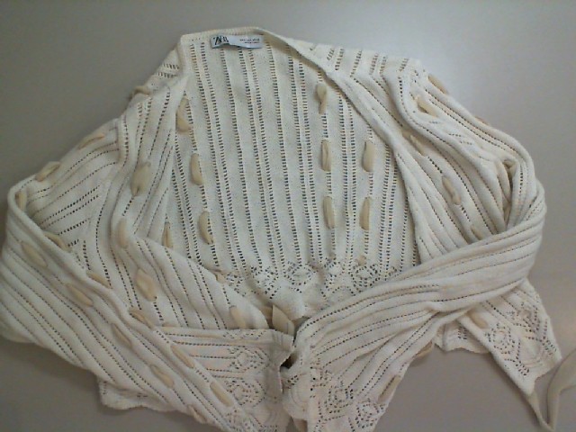 Beige knitted sweater Beige knitted sweater