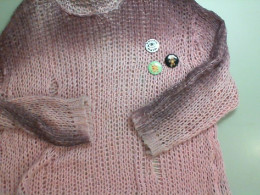 Pink knitted sweater