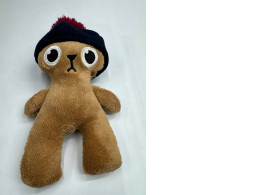 Doll wearing a hat Doll wearing a hat