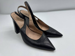 Women's black pointed high heels