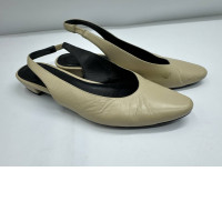 Women's cream-colored toilet slippers