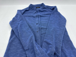 Women's blue long-sleeved round-neck shirt with buttons