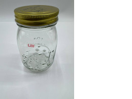Glass bottle with lid