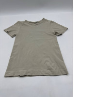 Cream-colored workout shirt