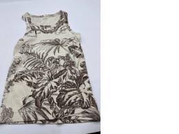 Women's white tank top with leaf pattern