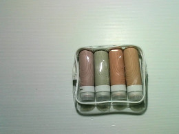 set of containers for lotion and shower gel