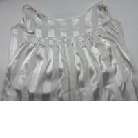 Women's white tank top and shorts with silver stripes