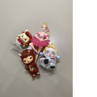 set of four toy figurines