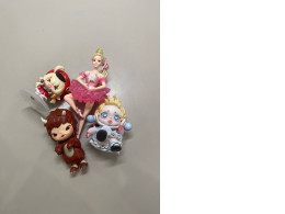 set of four toy figurines