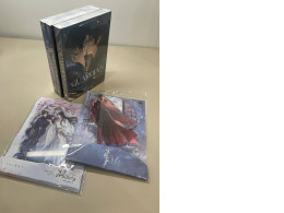 Zhen Hong - The Guardian, a three-volume collection that includes two sets of figurines of characters from the books