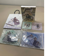 The Fei Tian - Dinghai Fusheng Collector's Set includes a book, two sets of character figurines two badges, and a gift bag.