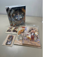 Gift set including a collection of two books, two sets of character figurines, two photocard and a magnet