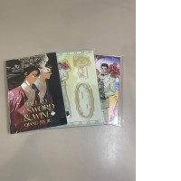 The set includes a book and two acrylic photographs