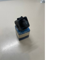 Car headlight adjustment button Car headlight adjustment button