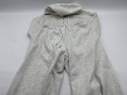 Long-sleeved hooded sweatshirt and gray pants 