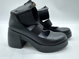 Black leather platform shoes