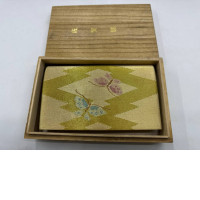  Women's gold silk handbag