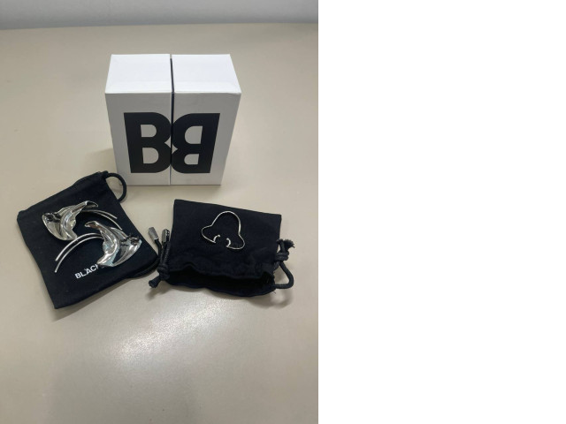 set of two decorative earrings and a nose ring complete with bags and a box set of two decorative earrings and a nose ring complete with bags and a box