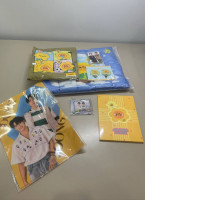 gift set which includes two pillowcases, a keychain, two hairpins, a magnet, a poster, a notebook