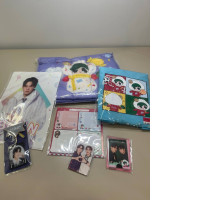 gift set, which includes: pillowcase, raincoat, two photographs, sticker set, keychain, poster