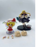 Set of 2 Japanese figures + spare parts