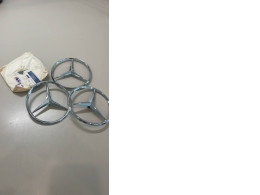set of four decorative mercedes emblems