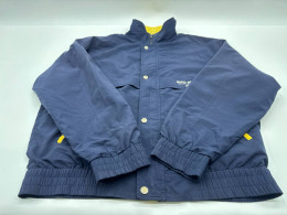 Blue zip-up and button-down windbreaker Blue zip-up and button-down windbreaker