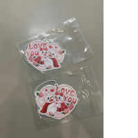 set of two bag keychains