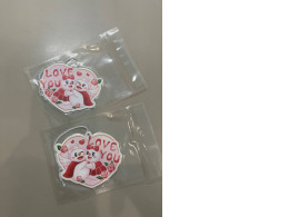 set of two bag keychains