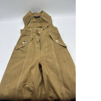 Women's sleeveless top and brown long pants 