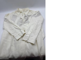 Women's white long-sleeved shirt and white trousers