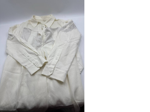 Women's white long-sleeved shirt and white trousers Women's white long-sleeved shirt and white trousers