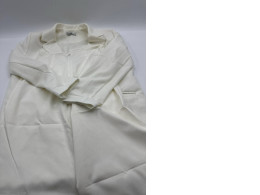 Women's white long-sleeved suit jacket and white trousers