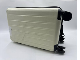 White rolling suitcase 