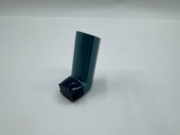 Asthma inhaler with cover