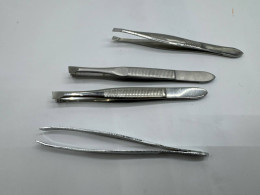 Set of  4 Hair removal tweezers 