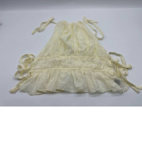 Women's cream-colored sleeveless shirt Women's cream-colored sleeveless shirt