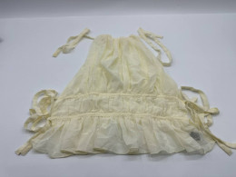 Women's cream-colored sleeveless shirt 