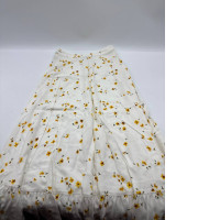 Long white skirt with floral pattern 