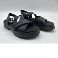 Black cross-strap sandals