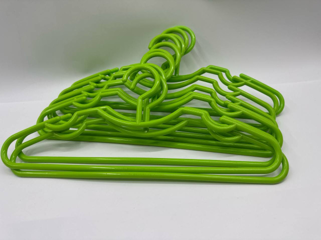 Set of 11 Green plastic hangers Set of 11 Green plastic hangers