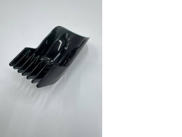 Hair clipper comb support Hair clipper comb support