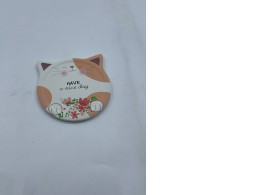 Cup stand in the form cat