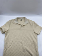 Cream-colored short-sleeved collared T-shirt Cream-colored short-sleeved collared T-shirt