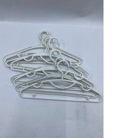 Set of  9 White plastic hangers 