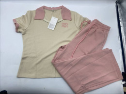 Set of 2 Cream-colored short-sleeved collared T-shirt and pink pants 