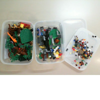 Set of 2 plastic containers with Lego parts, not new
